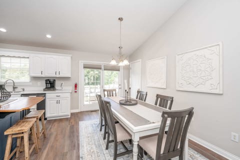 Dining area with table for 6 , and deck access