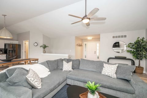 Curl up in the chic living room & enjoy a movie night at home