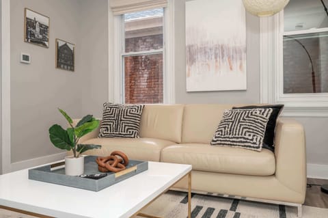 Unwind on the comfortable living room couch to enjoy a movie