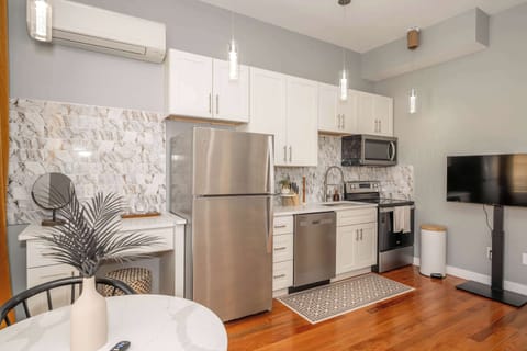 Enjoy meals together at the cozy dining table, offering seating for 2