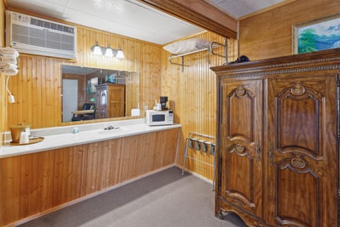 Standard Room, 2 Queen Beds | Bathroom | Combined shower/tub, hair dryer, towels