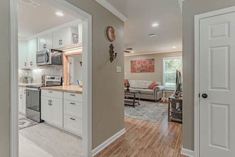 Entrance with kitchen to the left and living room ahead