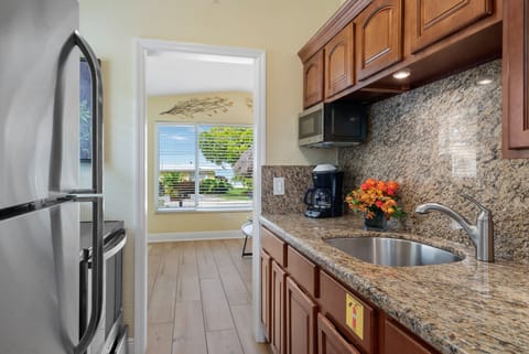 Cottage, 1 Queen Bed with Sofa bed, Kitchen (#06 Poolside with Tiki Hut) | Private kitchen | Fridge, microwave, highchair