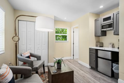 Deluxe Room, 1 King Bed, Balcony, Pool View (#16 No Children/Teens 2nd floor) | Living area | 50-inch Smart TV with cable channels, TV