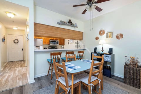 Dining table with seating for 4 and additional counter seating