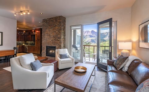 Living room summer views - unobstructed mountain views of the San Sophia ridgeline