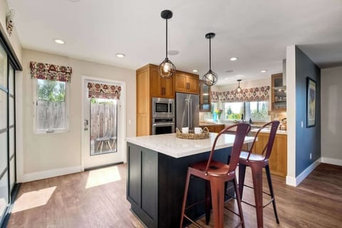 Sip morning coffee or grab a bite at the kitchen island, with seating for 2