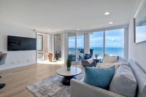 Curl up in the breezy living room & enjoy streaming with a stunning view