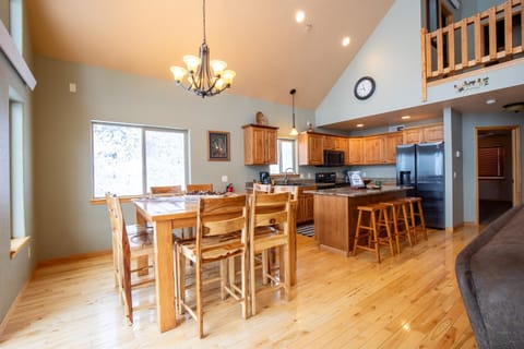 The kitchen is seamlessly tied to the spacious living room.