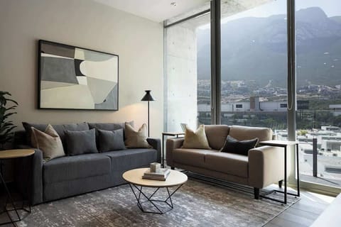 Relax in the living room with panoramic mountain vistas.