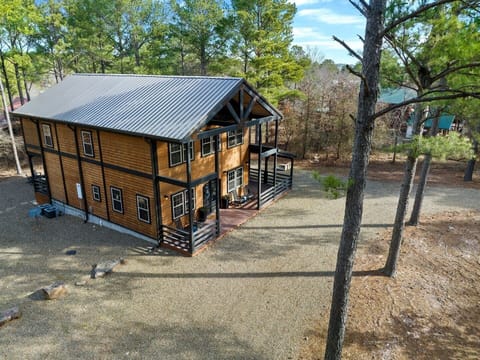 Welcome to the charming 2,300-sq-ft cabin, Times Like These, on wooded acreage.