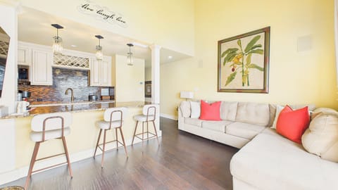 Open concept living area with comfortable furnishings and sleeper sofa + TV (sleeps 2)
