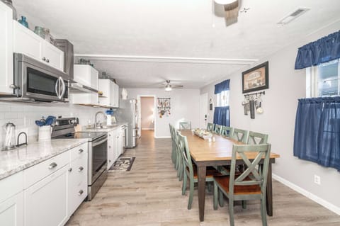 The expansive eat-in kitchen provides ample space and all the comforts of home