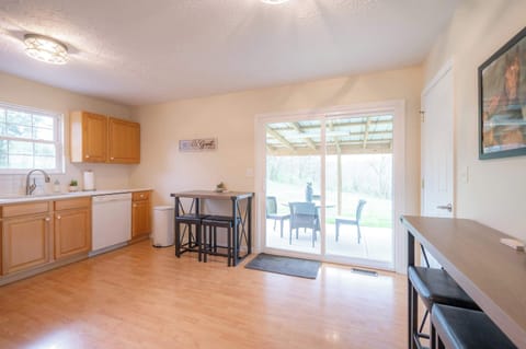 The warm, inviting kitchen offers ample space & all the comforts of home