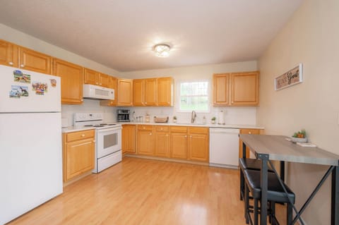 The warm, inviting kitchen offers ample space & all the comforts of home