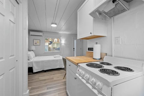 The cozy kitchen offers ample storage space & every home comfort