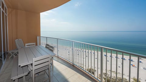 Savor gulf breezes at the outdoor table and watch the beach meet the horizon