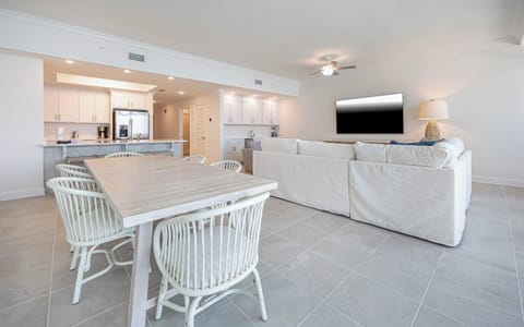 Relax on the cozy sofa with a queen sleeper in this inviting family room with a good movie