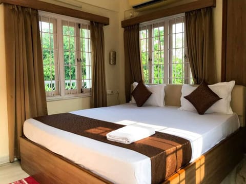 Deluxe Double Room, Balcony, City View | Laptop workspace, blackout drapes, free WiFi
