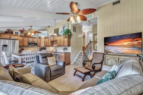 Centrally located, this two-level oceanfront retreat offers captivating views of the pool and ocean from its private balconies, perfect for your Hilton Head Island adventure.
