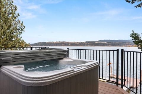 Hot tub on the main level deck and private boat dock below