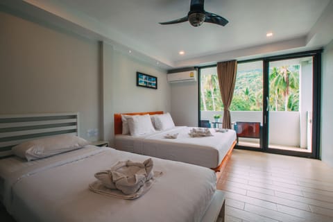 Deluxe Triple Room, 1 Bedroom | Free WiFi, bed sheets