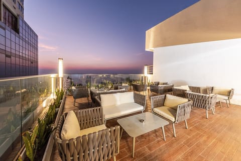 Rooftop bar, ocean views, open daily