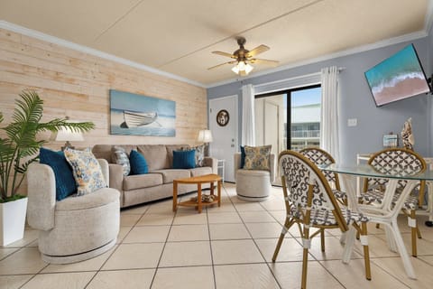 Settle into your living area, complete with a sleeper sofa, TV, and dining table with seating for 3. 