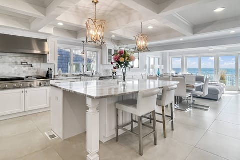 Gather around!  Open-concept space flows from kitchen to cozy living space