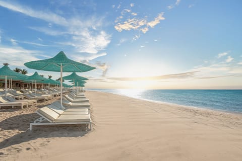 Private beach nearby, free beach shuttle, sun loungers, beach umbrellas
