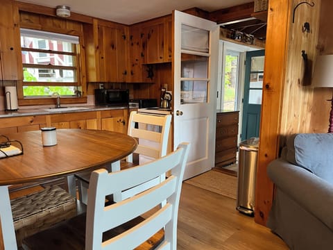 Kitchen w/ door to den.