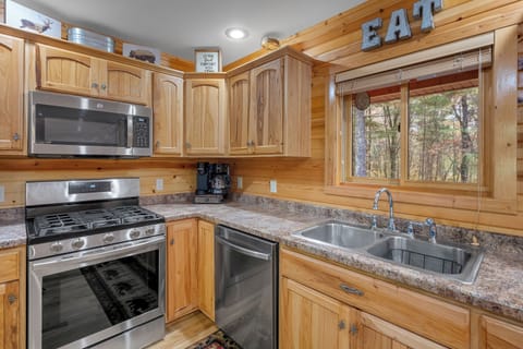 Fully stocked kitchen to prepare meals in and gather.  There is plenty of space to sit at the counter as well as the dining room table.