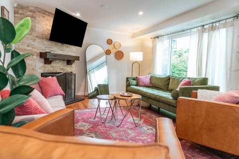 Curl up in the chic living room & stream your favorites on the smart TV