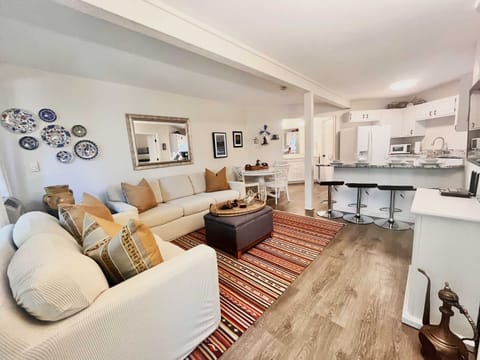 Living, dining, and kitchen area