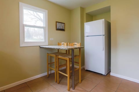 Enjoy morning coffee and meals in the kitchen, offering table seating for 2