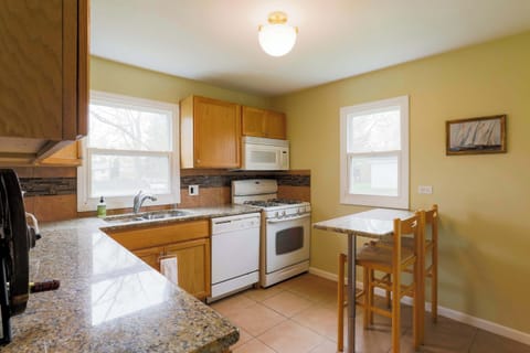 Enjoy morning coffee and meals in the kitchen, offering table seating for 2