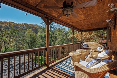 Enjoy outdoor seating for 8 on the spacious front porch