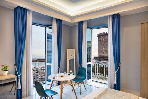 Exclusive Suite, Balcony, Sea View | Living area | 42-inch Smart TV with cable channels, Netflix, streaming services