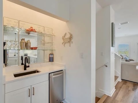 The built-in ice maker in the bar comes in handy when filling the cooler for a sun-filled day at the beach