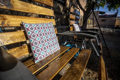 Relax with a cool drink on our backyard swing!