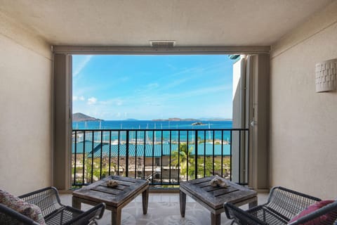View from inside looking out to balcony Caribbean sea BVI and St John