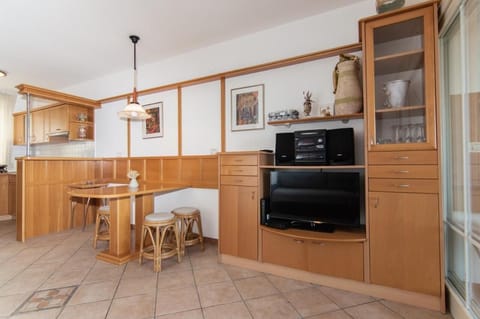 Family Apartment, 2 Bedrooms, Sea View, Beachside | Living area | Flat-screen TV