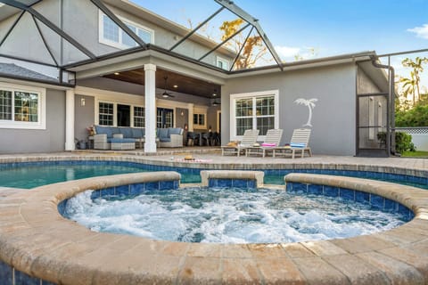 A serene escape with poolside comfort and a bubbling spa!