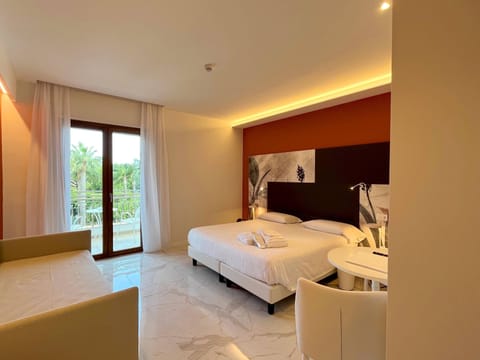 Deluxe Double or Twin Room | Down comforters, minibar, in-room safe, desk