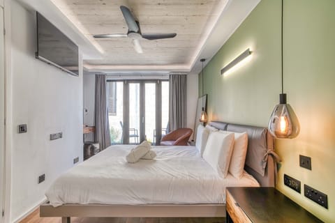 Deluxe Double Room, Balcony, City View | Minibar, desk, laptop workspace, iron/ironing board