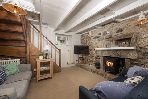 The woodburner, Tv and seating for all guests - No.1 St Eia