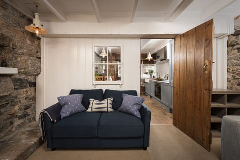 A sofa with scatter cushions - No.1 St Eia