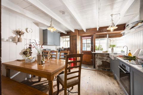 The kitchen and dining room - No.1 St Eia