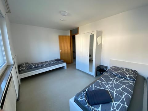 Bedroom 1 | 2 comfortable single beds and wardrobe