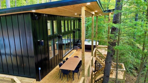 Massive double decker with hot tub in the canopy of the trees!